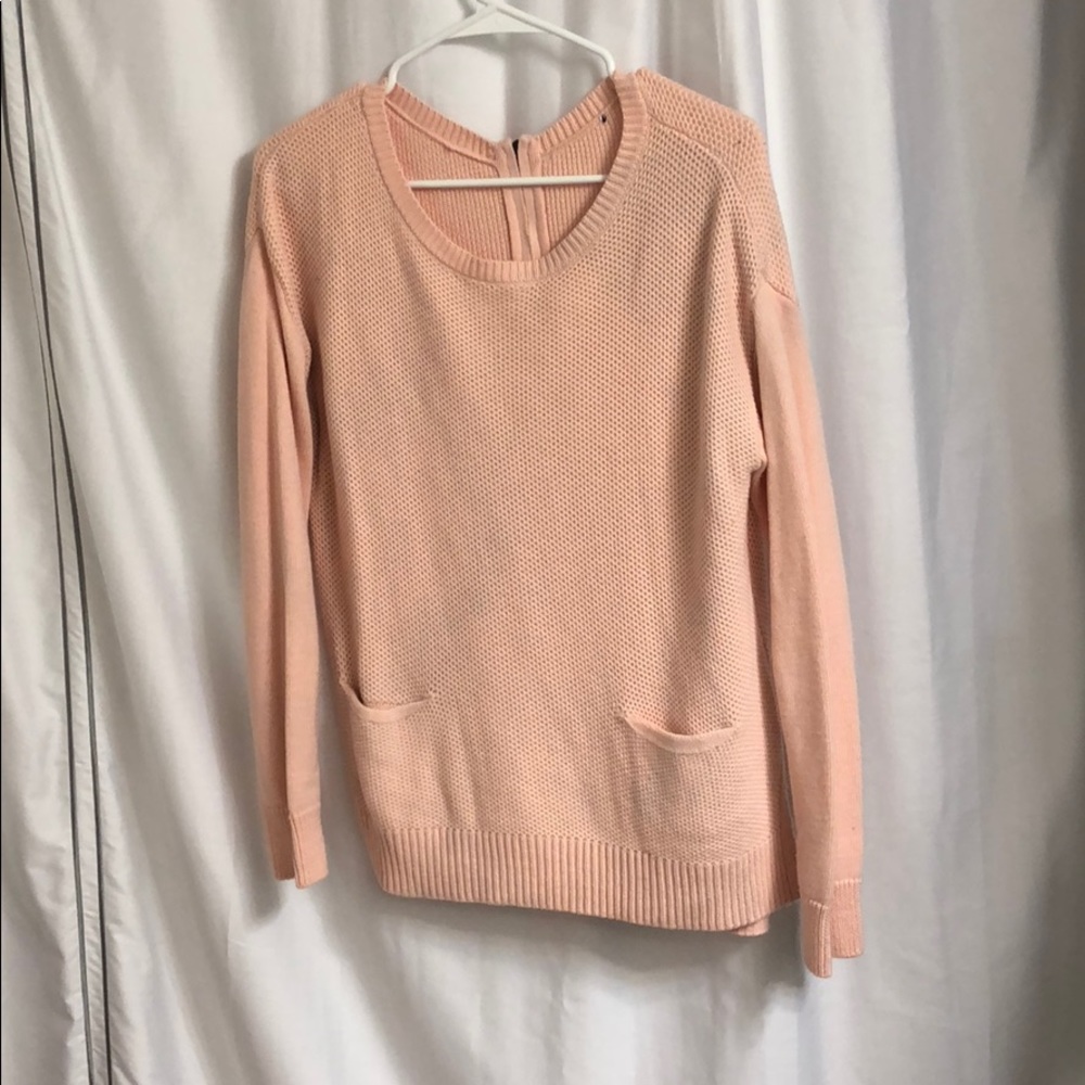 PINK SWEATER WITH POCKETS AND ZIP UP BACK